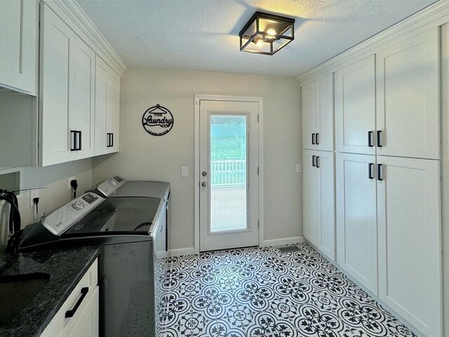 111 Country Club Pl, Southbridge, MA 01550 - washroom with cabinet space, independent washer and dryer, and a textured ceiling