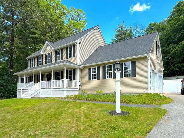 111 Country Club Pl, Southbridge, MA 01550 - colonial house featuring covered porch, driveway, a shingled roof, and a garage