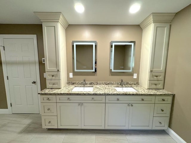 111 Country Club Pl, Southbridge, MA 01550 - bathroom featuring baseboards and double vanity