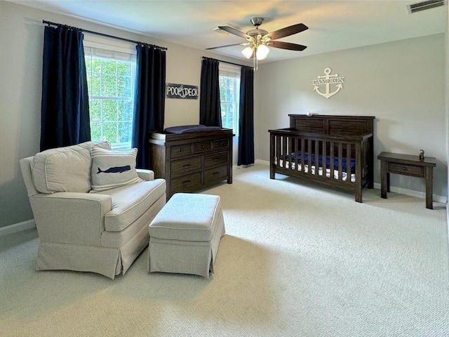 111 Country Club Pl, Southbridge, MA 01550 - carpeted bedroom with multiple windows, a ceiling fan, and a nursery area