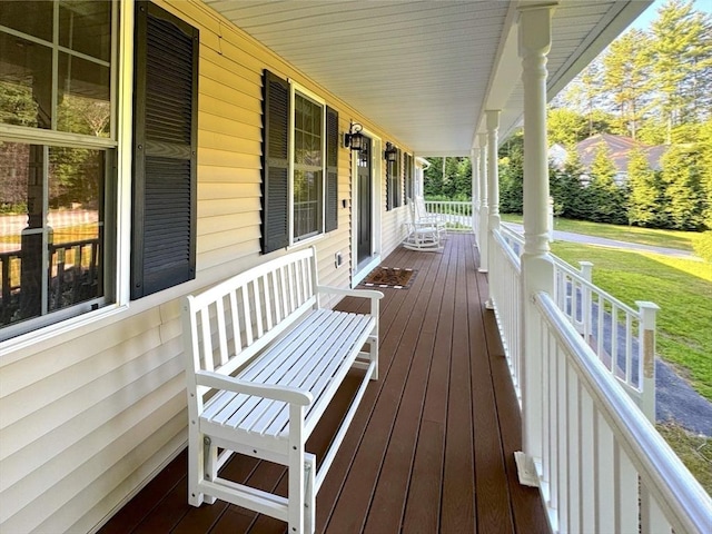 111 Country Club Pl, Southbridge, MA 01550 - wooden porch featuring a lawn