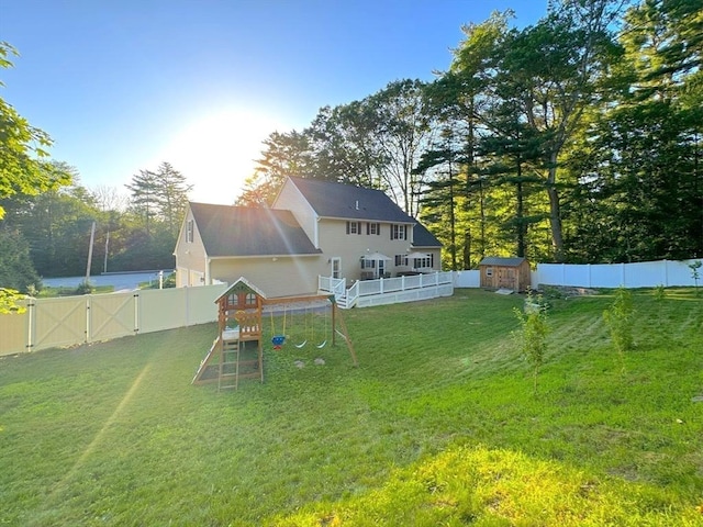 111 Country Club Pl, Southbridge, MA 01550 - fenced backyard featuring a playground and a shed