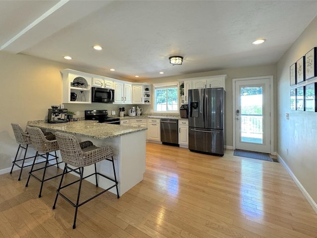 111 Country Club Pl, Southbridge, MA 01550 - kitchen featuring black appliances, open shelves, a peninsula, white cabinetry, and recessed lighting