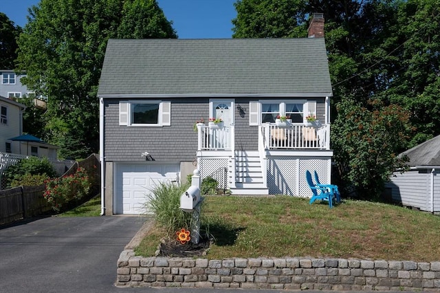 29 Wituwamat Rd, Weymouth, MA 02191 - cape cod house featuring stairway, a chimney, an attached garage, asphalt driveway, and a front lawn