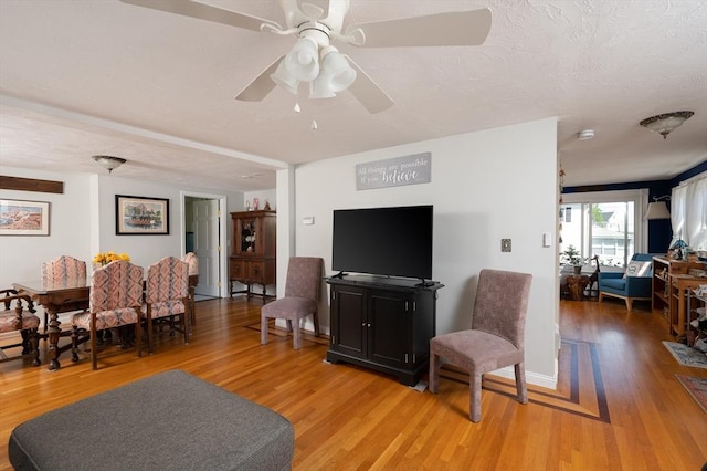 29 Wituwamat Rd, Weymouth, MA 02191 - living area with light wood finished floors and ceiling fan