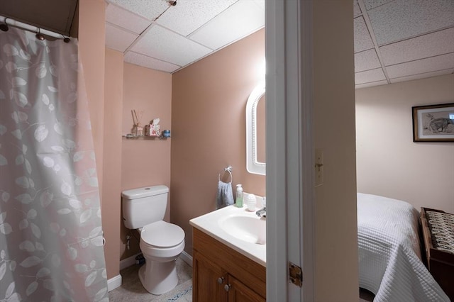 29 Wituwamat Rd, Weymouth, MA 02191 - full bath with a drop ceiling, toilet, vanity, baseboards, and a shower with shower curtain
