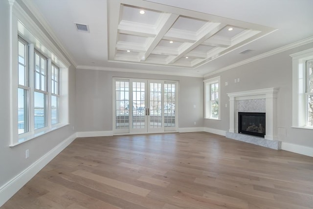 128 Elm St Unit 210, Cohasset, MA 02025 - unfurnished living room with coffered ceiling, ornamental molding, light wood-style flooring, beam ceiling, and a fireplace