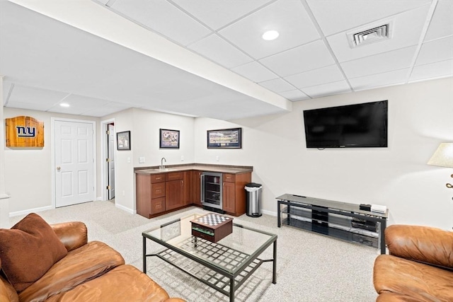 102 Saddleworth Way, Middleboro, MA 02346 - living area featuring bar with sink, beverage cooler, light carpet, a paneled ceiling, and recessed lighting