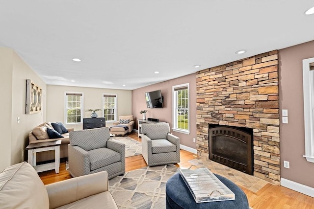 102 Saddleworth Way, Middleboro, MA 02346 - living area featuring healthy amount of natural light, light wood-style floors, recessed lighting, and a fireplace