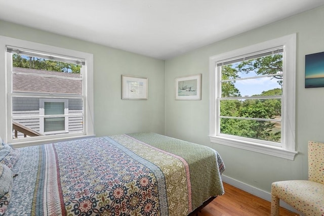 22 Wallace Pt, Bourne, MA 02532 - bedroom with wood finished floors and baseboards