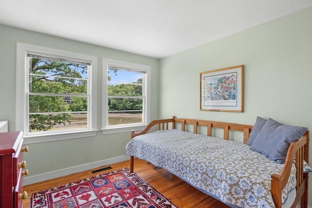22 Wallace Pt, Bourne, MA 02532 - bedroom featuring wood finished floors and baseboards