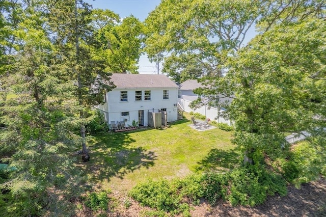 22 Wallace Pt, Bourne, MA 02532 - rear view of property featuring a yard and stairway