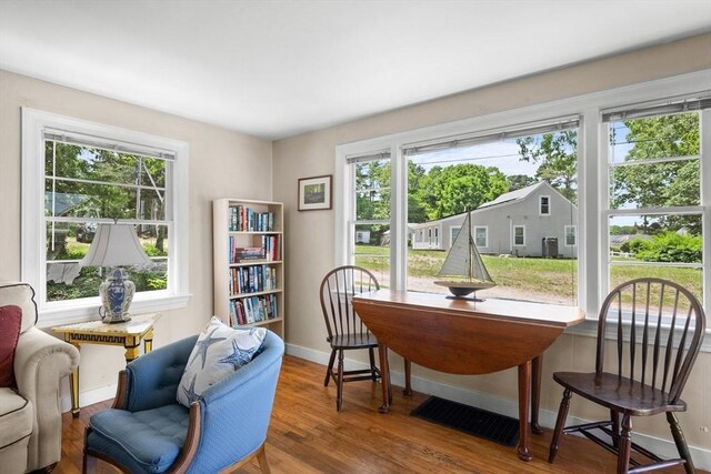 22 Wallace Pt, Bourne, MA 02532 - home office with healthy amount of natural light, wood finished floors, and baseboards