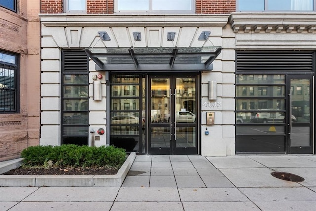 43 Westland Ave Unit 512, Boston, MA 02115 - view of exterior entry with french doors and stone siding