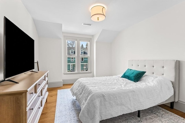 4 Norwood St, Winchester, MA 01890 - bedroom featuring light wood finished floors and lofted ceiling