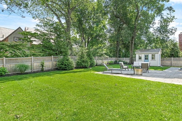 4 Norwood St, Winchester, MA 01890 - fenced backyard with a patio and an outdoor structure