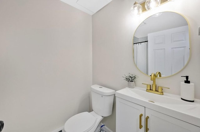 full bath featuring toilet and vanity