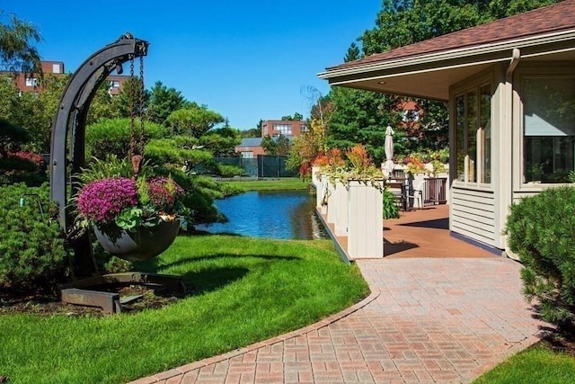 99 Florence St Unit 40-2B, Newton, MA 02467 - view of grassy yard featuring a water view