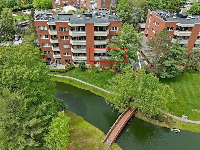 99 Florence St Unit 40-2B, Newton, MA 02467 - drone / aerial view of apartment complex / building and a nearby body of water