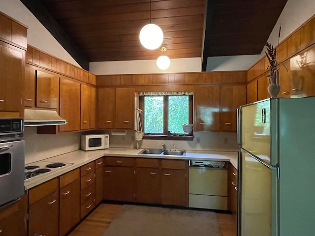 kitchen with sink, wooden ceiling, hanging light fixtures, vaulted ceiling, and appliances with stainless steel finishes