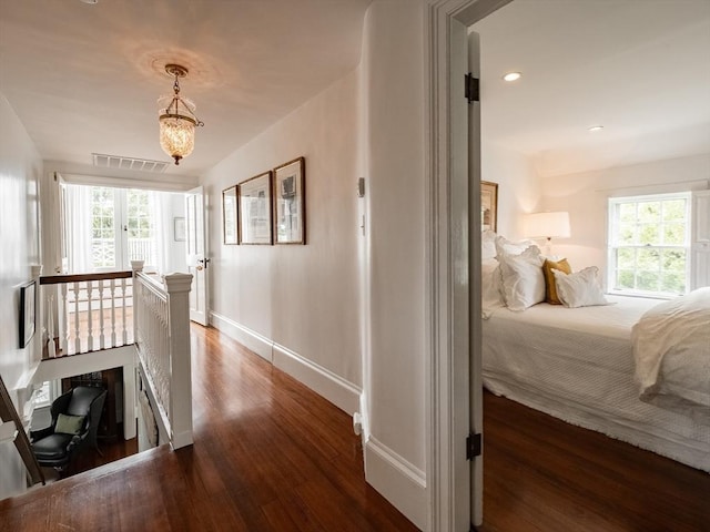 11 Water St, Duxbury, MA 02332 - hall featuring healthy amount of natural light, wood finished floors, an upstairs landing, baseboards, and recessed lighting