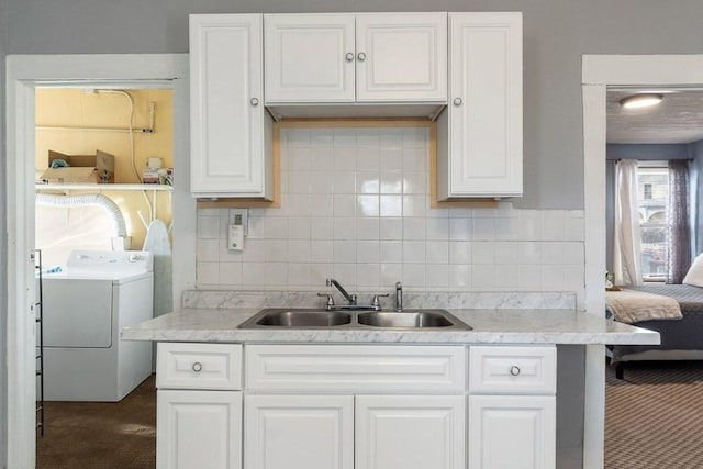 14 Hancock St, Worcester, MA 01610 - kitchen featuring white cabinetry, carpet flooring, and backsplash