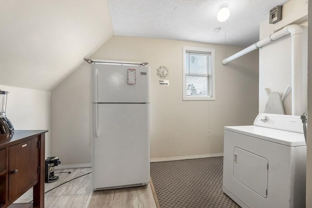 14 Hancock St, Worcester, MA 01610 - laundry room featuring washer / dryer and baseboards
