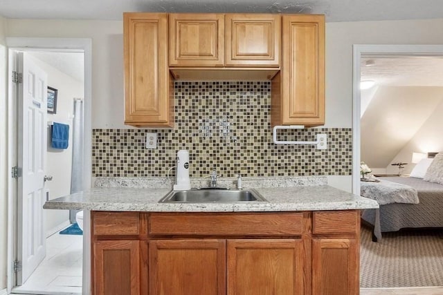 14 Hancock St, Worcester, MA 01610 - kitchen featuring backsplash and light stone countertops