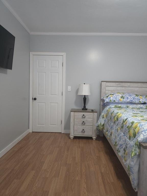 14 Hancock St, Worcester, MA 01610 - bedroom featuring wood finished floors and crown molding