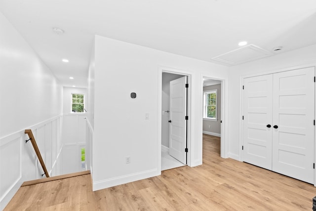 spare room featuring light hardwood / wood-style floors