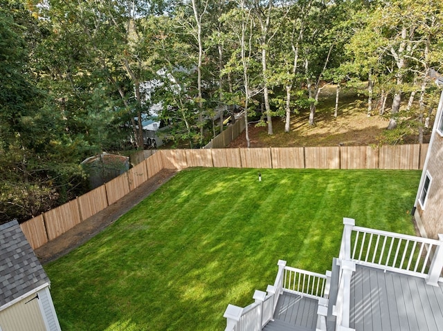 view of yard with a wooden deck