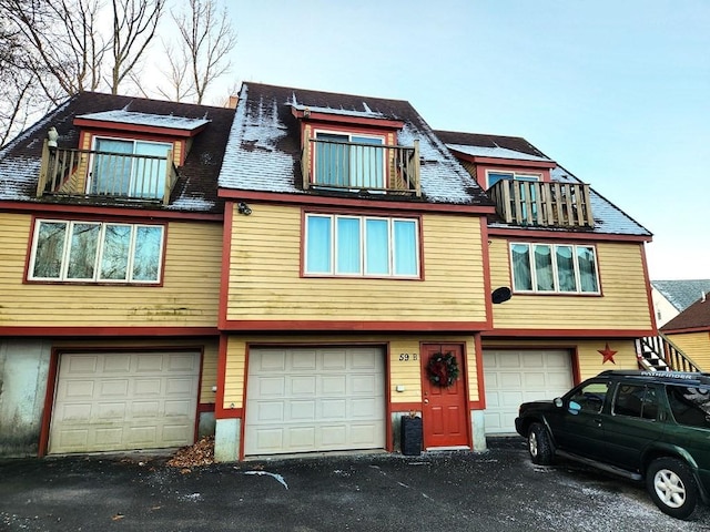 view of front of home with a balcony