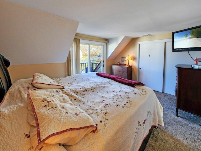 bedroom featuring carpet flooring, access to exterior, vaulted ceiling, and a closet