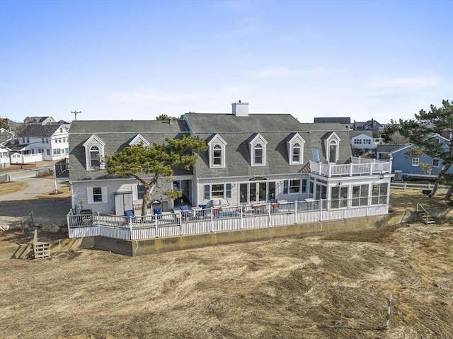 back of property featuring a residential view, a patio, and fence