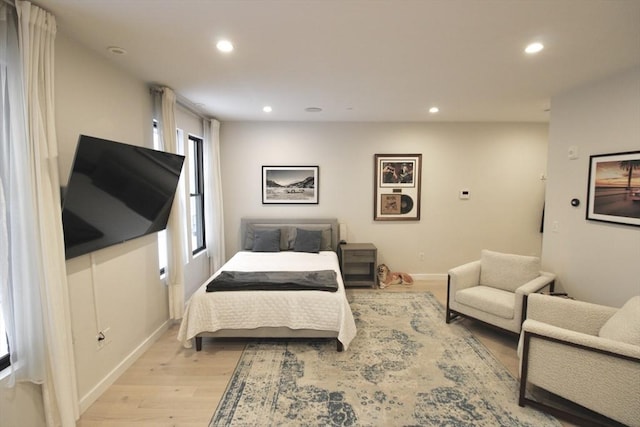 bedroom featuring light wood-type flooring