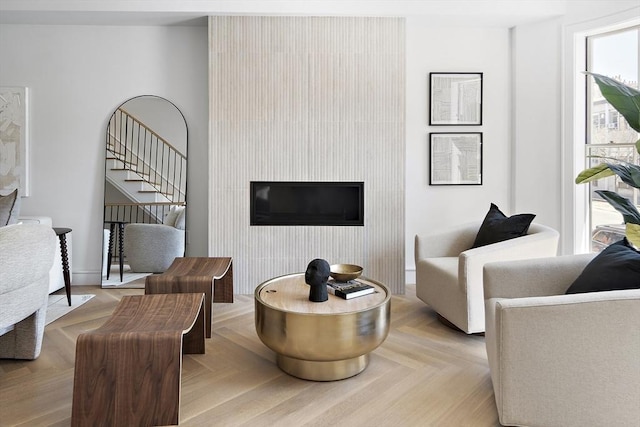 living room featuring light parquet floors