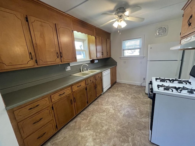 3 Camden St, South Hadley, MA 01075 - kitchen with white dishwasher, a sink, a ceiling fan, gas range, and under cabinet range hood