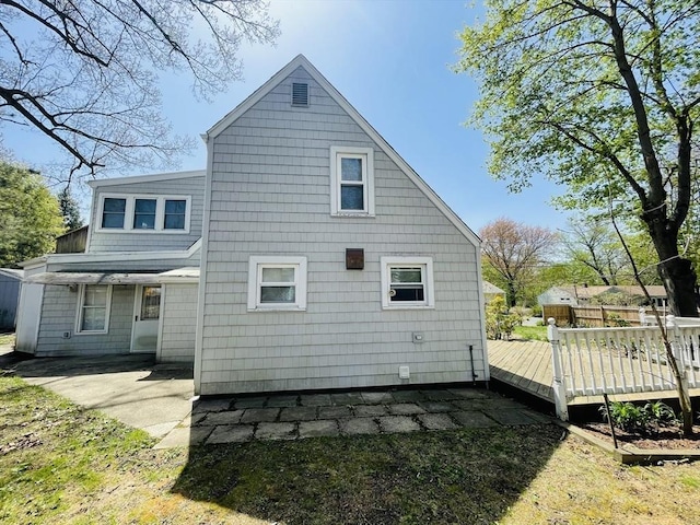 3 Camden St, South Hadley, MA 01075 - back of property featuring a patio and a deck