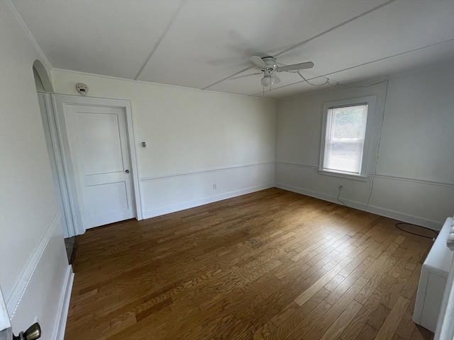 3 Camden St, South Hadley, MA 01075 - spare room with a ceiling fan, dark wood finished floors, and arched walkways