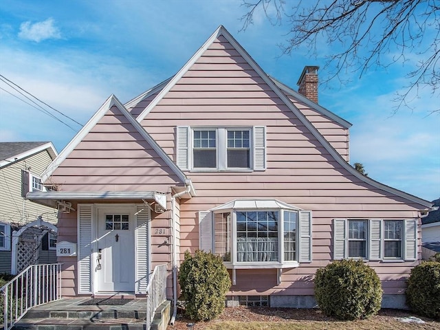 view of front of house with a chimney