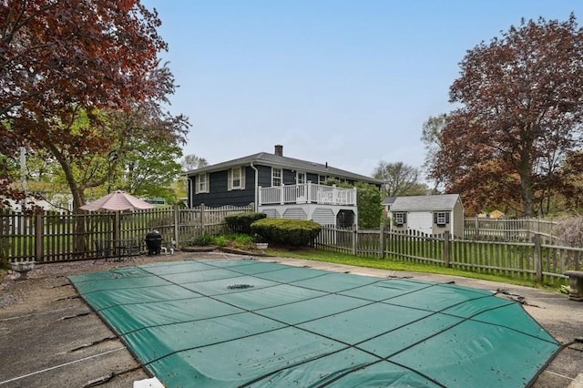view of pool with a fenced backyard, a fenced in pool, and a yard