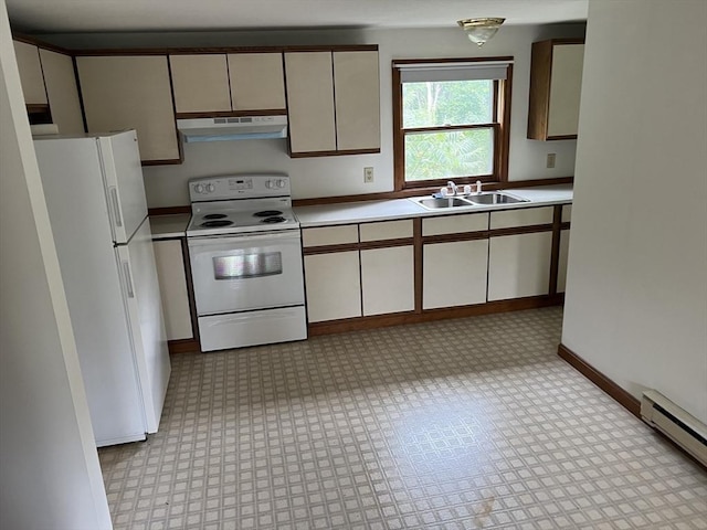 kitchen with light floors, light countertops, a sink, white appliances, and extractor fan