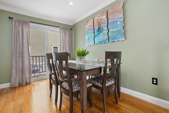 224 Grove St Unit 2, Waltham, MA 02453 - dining space featuring ornamental molding, light wood-style floors, and recessed lighting