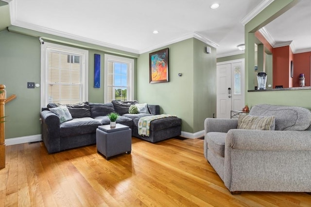 224 Grove St Unit 2, Waltham, MA 02453 - living room with light wood-style flooring, crown molding, and recessed lighting