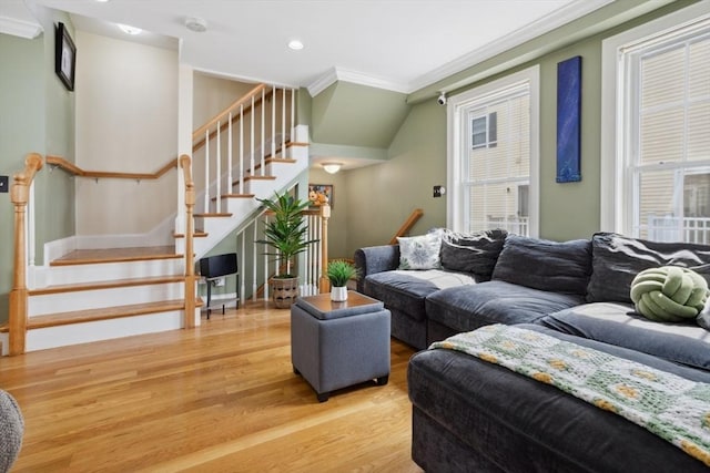 224 Grove St Unit 2, Waltham, MA 02453 - living area featuring wood finished floors, ornamental molding, plenty of natural light, stairway, and recessed lighting
