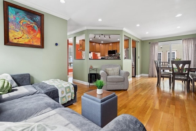 224 Grove St Unit 2, Waltham, MA 02453 - living area with crown molding, light wood-style flooring, and recessed lighting