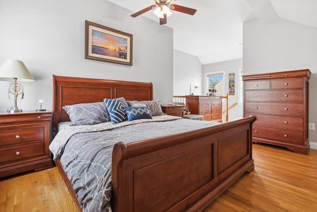 224 Grove St Unit 2, Waltham, MA 02453 - bedroom with vaulted ceiling, light wood-type flooring, and ceiling fan