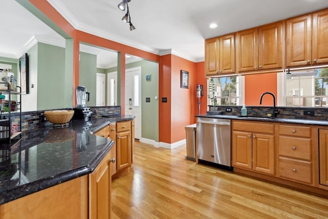 224 Grove St Unit 2, Waltham, MA 02453 - kitchen featuring dishwasher, light wood-type flooring, decorative backsplash, dark stone countertops, and crown molding