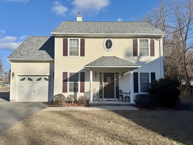 view of front of home featuring a garage and covered porch