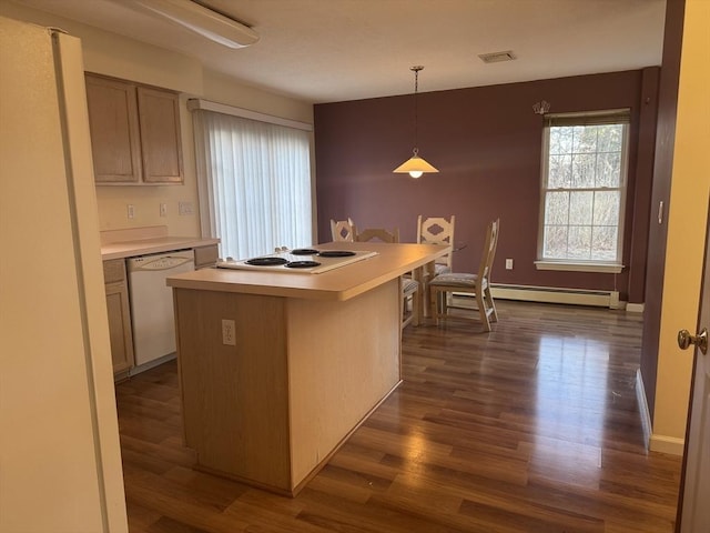 kitchen featuring dark wood-type flooring, hanging light fixtures, a kitchen island, white appliances, and a baseboard heating unit